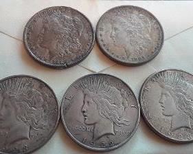h Morgan Peace dollars