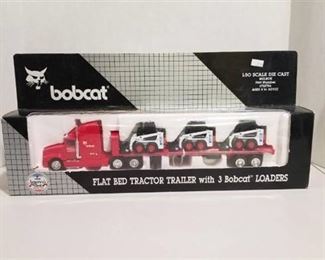 Bobcat 1:50 scale Flat bed tractor/trailer with 3 Bobcat loaders NIB