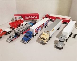 7 items / 1/64 scale / 5 semi-JB Hunt / USA / K semi w/2 gravity trailers / Coca Cola Semi/ Parts america Pickup w/5th trailer