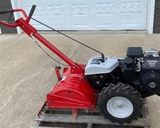 EXCELLENT Huskee 18" Honda Tiller used for one small project. Honda engine and always kept in shop. Looks even nicer in person.