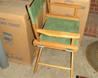 DIRECTOR'S CHAIR WITH 4 MORE IN BOXES.