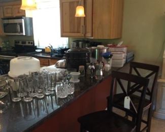 Glassware. Counter height stools.