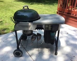 Weber charcoal grill with table cart