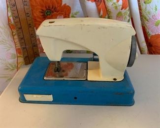 Unmarked Blue and White Small Sewing Machine $6.00