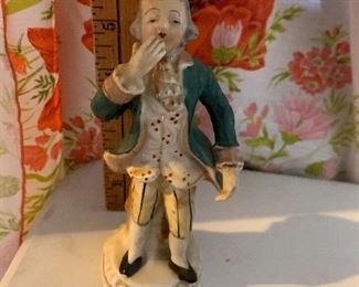 Figurine of Man Blowing a Kiss $6.00