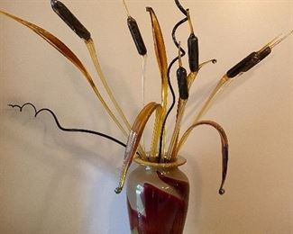 Tall glass vase with glass cattails and reeds. 
Vase is 18-1/2”H . Total sculpture is 41”