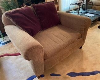 One of a pair of oversized chairs