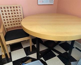 Round table 50” diameter with one 18” leaf and 4 chairs