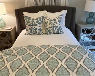 John Robshaw organic cotten queen duvet ; Pair of Custom pillows from Bungalow Classic with down inserts each) ; Melrose queen upholstered bed in gray velvet from Bungalow Classic