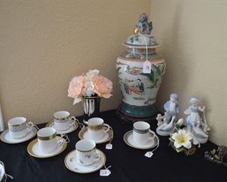 Oriental vase, tea cups, porcelain figurines