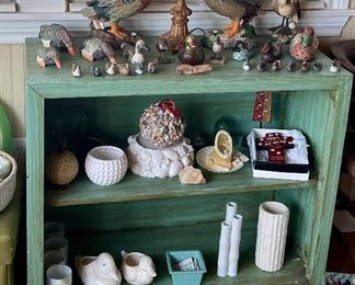 cute green shelf with duck statues