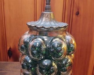 Jar with green marbles
