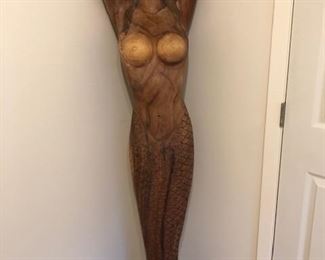 Life size wood mermaid is 5 ft 8 in tall