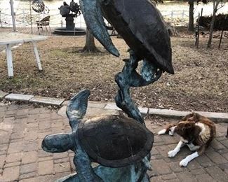 This water sculpture is 63 ", over 5 ft tall!  Water streams from mouth of both turtles. 