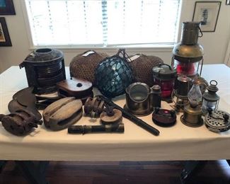 Collection of vintage nautical items, including brass binnacle ship compass