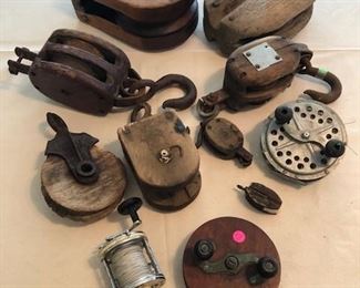 Antique and vintage nautical pulleys and fishing reels