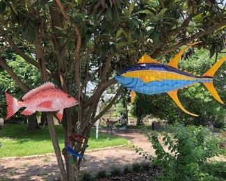 Large 2 sided hanging fish.  Larger blue and yellow one is 4 ft.