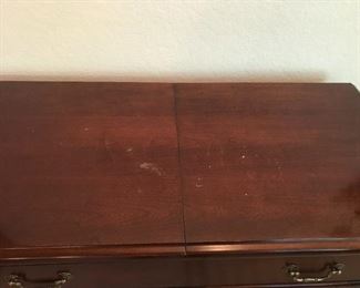 Small blemishes on top of server .