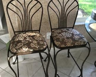 Pair of metal frame counter height bar stools. Fabric matches the dinette set.