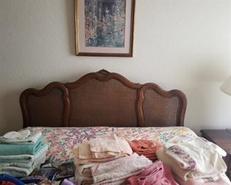 Queen bed with mattresses, frame and cane headboard