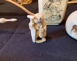 Netsuke with rotating faces