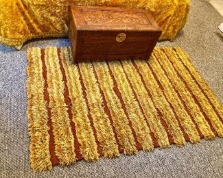 Striped orange shag rug