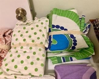 The green twin sheet set on the right has a wild 1970's print by Scuda