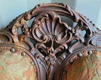 Ornate Detailing on the Wood Carving of the Settee