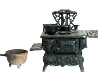 https://www.gallery63.net/auction-lot/american-atf-cast-iron-salesman-sample-stove_5D14452A2A