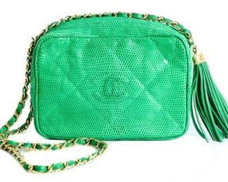 https://www.gallery63.net/auction-lot/rare-chanel-green-cc-lizard-leather-camera-bag_87A49AC97D