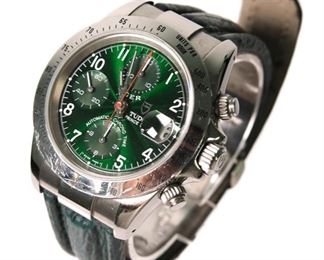 https://www.gallery63.net/auction-lot/tiger-woods-tudor-prince-rolex-green-chronograph_C9347B58B3