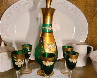 decanter with gold leaf over green glass* 5 demitasse glasses ( 6th one broken at stem)