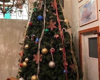 13 ft artificial Christmas tree(Photos by BC of Capitol Sales Services ) ...To Register and To Bid go to https://capitolsalesservices.hibid.com