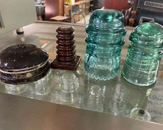 More old insulators ...........To Register and To Bid go to https://capitolsalesservices.hibid.com..