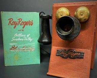 1950s Roy Rogers Book and Roy Rogers plastic toy wall telephone  (Photos by BC of Capitol Sales Services ) ...To Register and To Bid go to https://capitolsalesservices.hibid.com..