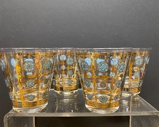 A set of four mid century old fashions glass tumblers with 'Aztec' pattern by Culver.  Culver Glass was founded in Brooklyn, NY.  Each are signed Culver in script.  
