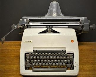 Early 1970s Olympia typewriter  ...To Register and To Bid go to https://capitolsalesservices.hibid.com..