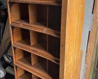Mid century modern oak barrister or document cabinet with a Wellington style locking swing panel..............To Register and To Bid go to https://capitolsalesservices.hibid.com..