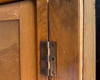 The hinged locking panels for the mid century modern oak  barrister or document cabinet .....To Register and To Bid go to https://capitolsalesservices.hibid.com..
