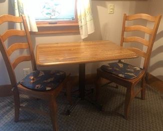 Bassett chairs and pedestal dinette
