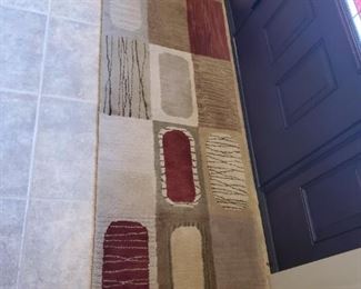 Two Kaleen Portals wool rugs: 2'3" x 7'6" and 8' x 11'