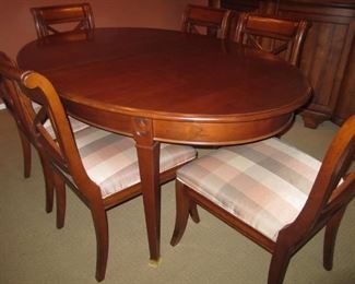 TABLE WITH 2 LEAVES 6 CHAIRS AND MATCHING BUFFET BY HARDEN AND PADS