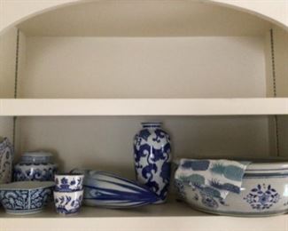 blue and white pottery lot with wall pocket