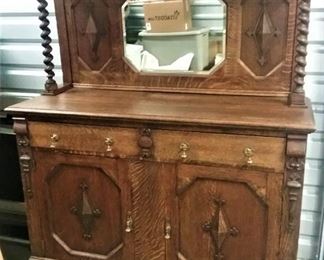 Antique Sideboard with Barley Twist Columns, Mirror Back and pull out drawer for bottles Asking $250