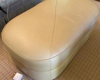 Baker cream leather ottoman.