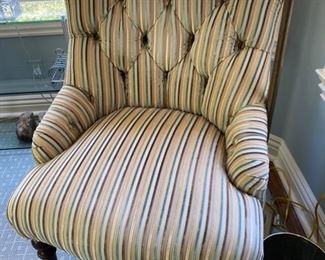 Tufted button back Victorian armchair.