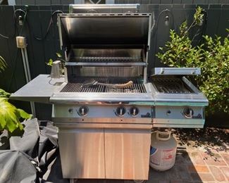 PGS gas BBQ with all the attachments including rotisserie and extra burner. $2300.