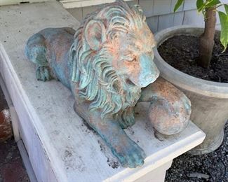 Two Antique Bronze garden lions.