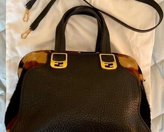 Very rare vintage Fendi pebbled leather purse with a convertible top handle with brass & cowhide trim.