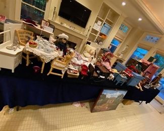Huge collection of American Girl dolls and extra furniture, wardrobe and backgrounds.